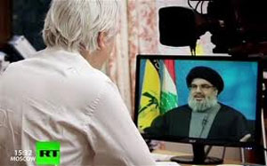Assange debuta como presentador