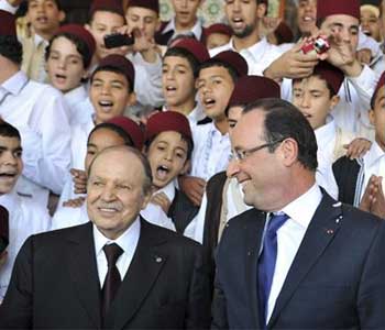 boutrflika+hollande+argelia En su segundo día en Argelia