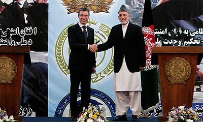 karzai rasmussen Autoridades afganas asumen control de seguridad en todo el país