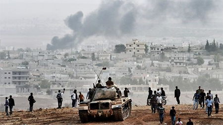 observan la batalla desde el lado turco Kobani resiste uno de los ataques más fuertes