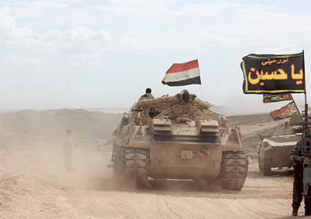 fuerzas iraquíes en uno de los accesos a Tikrit Las Fuerzas iraquíes entran en Tikrit desde tres direcciones