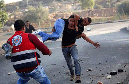 un palestino herido en efrentamiento Toda Palestina se levanta contra la ocupación sionista
