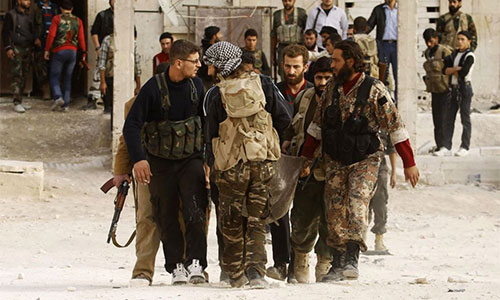hombres armados en Siria Otros diez grupos armados se suman al cese del fuego en Siria
