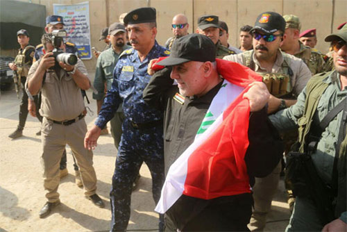 El primer ministro iraquí, Haider al Abadi, en Mosul Iraq anuncia oficialmente la liberación total de Mosul