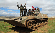 Camino a la estratégica ciudad de Yisr al Shugur