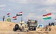 Militares iraquíes y kurdos se reúnen en Mosul